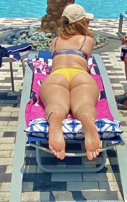 Teen soles at the pool 